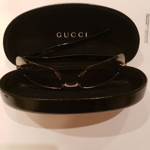 Gucci female authentic glasses in its original case in good condition.